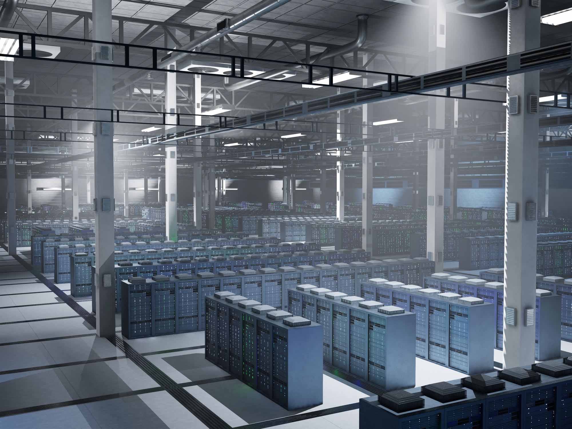Wide-angle view of a massive hyperscale data center facility featuring rows of high-density server racks in an industrial IT environment.